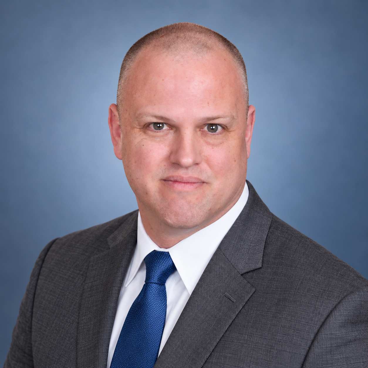 Headshot of TJ Barker, senior loan officer with the John Thomas Team in Newark, DE - NMLS #108382