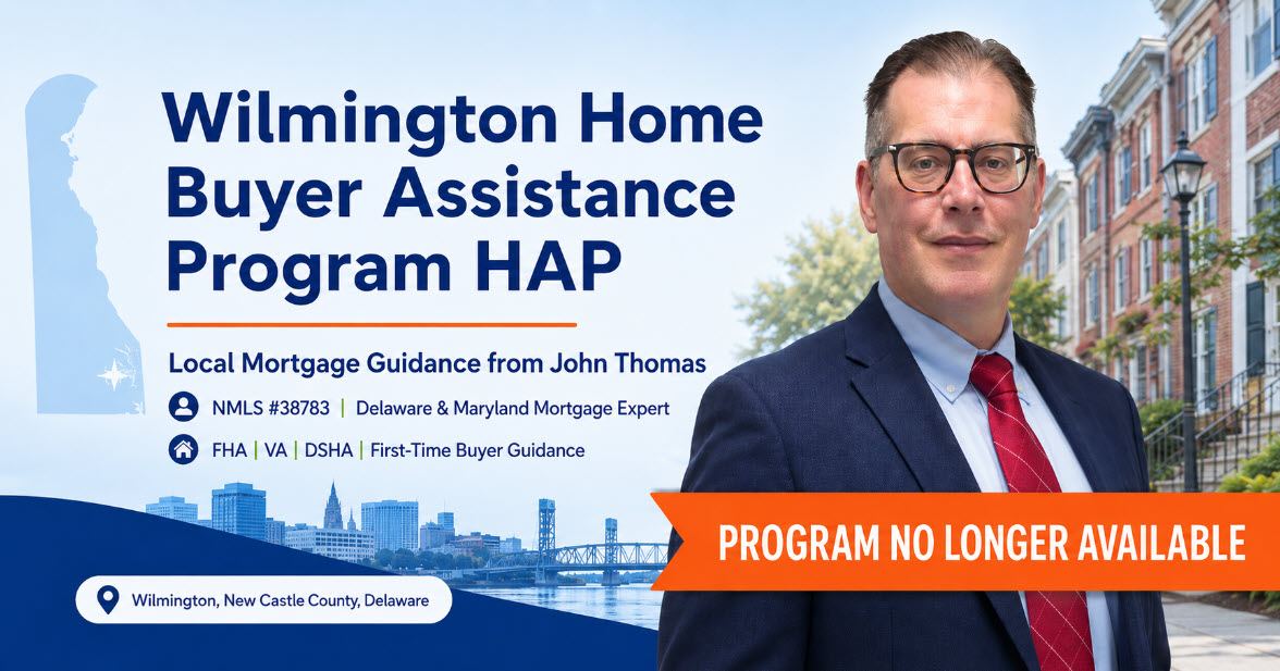 John Thomas, mortgage loan officer with the John Thomas Team, holding a comparison chart of current Wilmington Delaware down payment assistance alternatives in front of a Wilmington row-house street - NMLS #38783